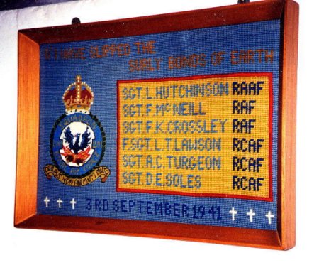 A tapestry plaque bearing squadron badge and the names of the crew is now displayed in Stapleford Church